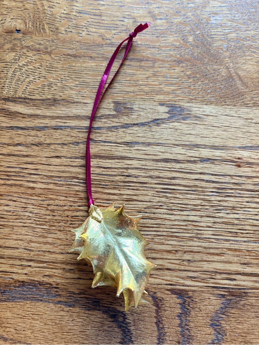 24K Gold Holly Leaf Hanging Christmas Ornament with Burgundy ribbon hanger